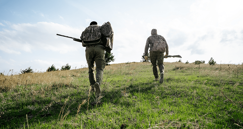 hunting party in open air truck