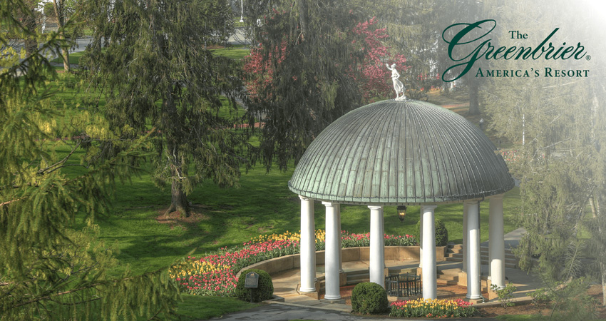 bird's eye view of a round pavilion near a golf course